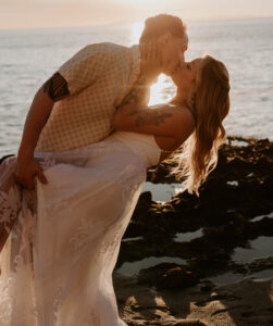 Bride and groom on the cliffs in Laguna Beach, California 